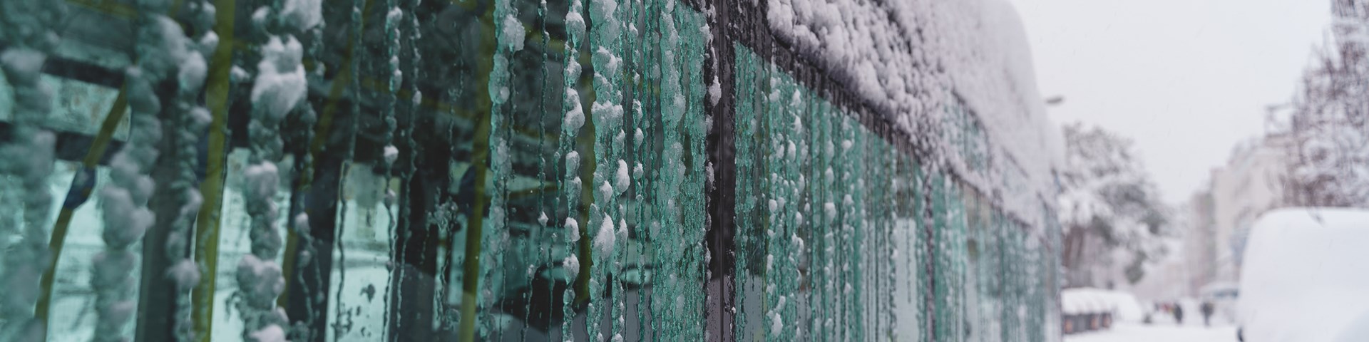 Close up of frozen windows on bus